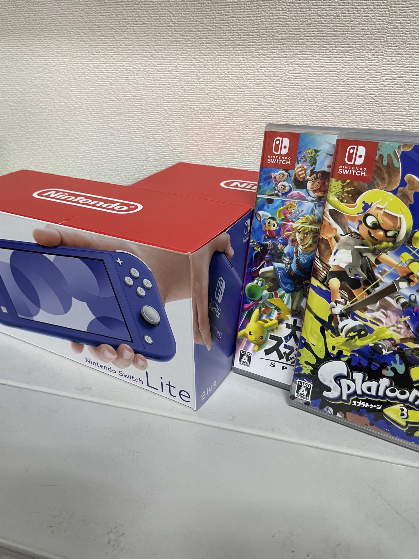 買取商品：任天堂　Nintendo Switch Lite ブルー 2台 + ソフト2点　新品